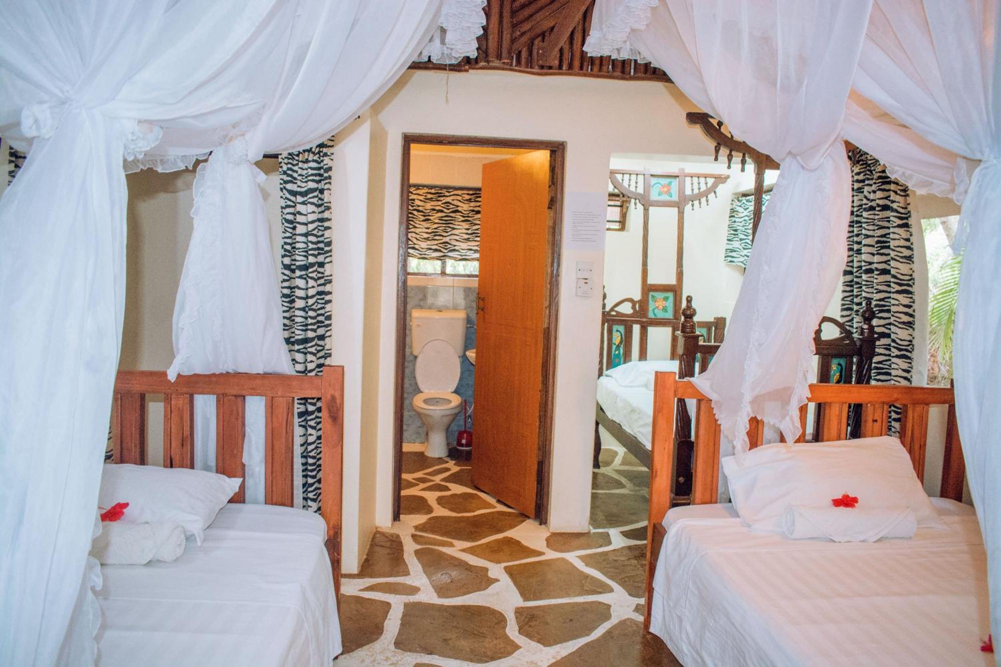 Kijani Cottages In Diani Praia de Diani Exterior foto