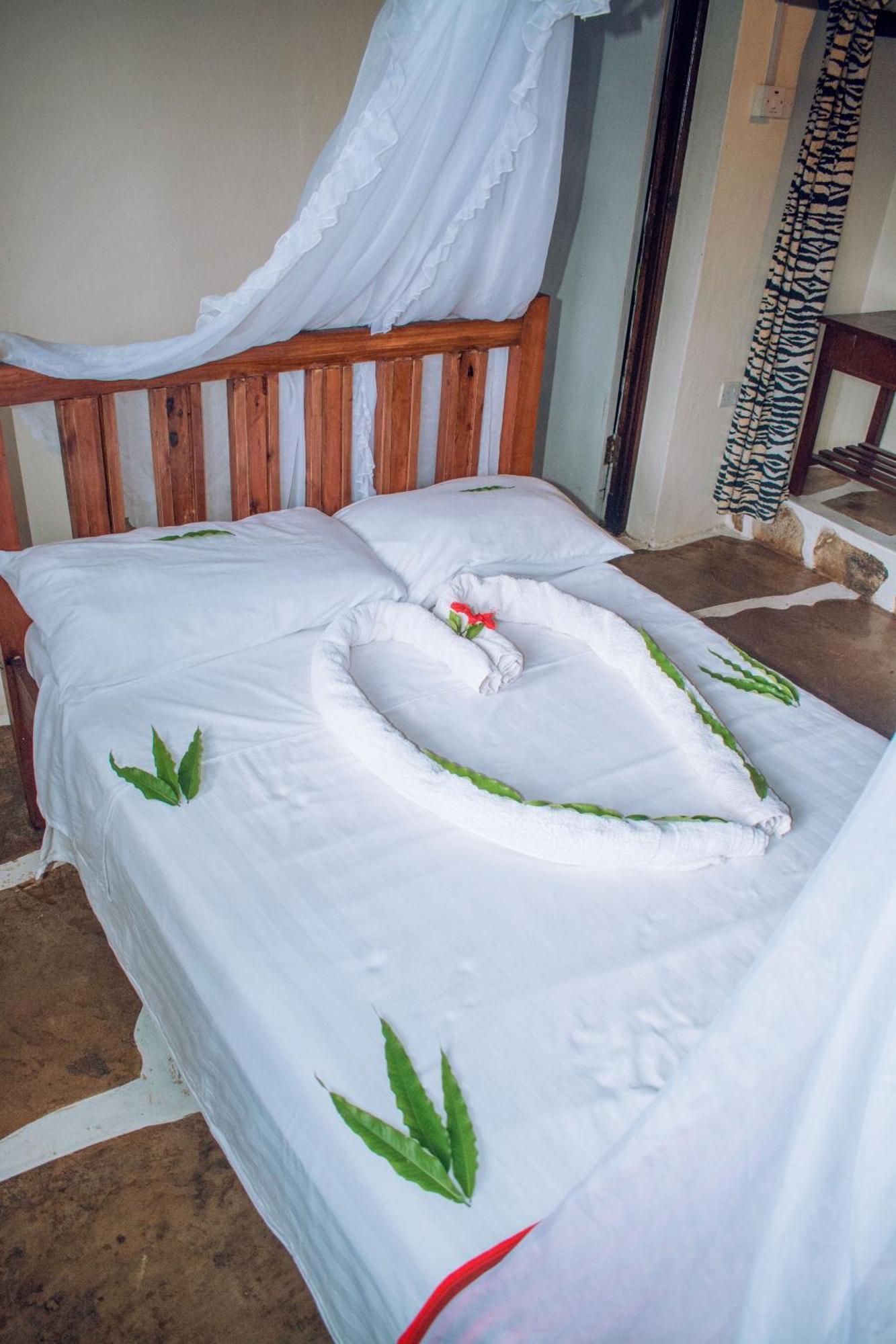 Kijani Cottages In Diani Praia de Diani Exterior foto