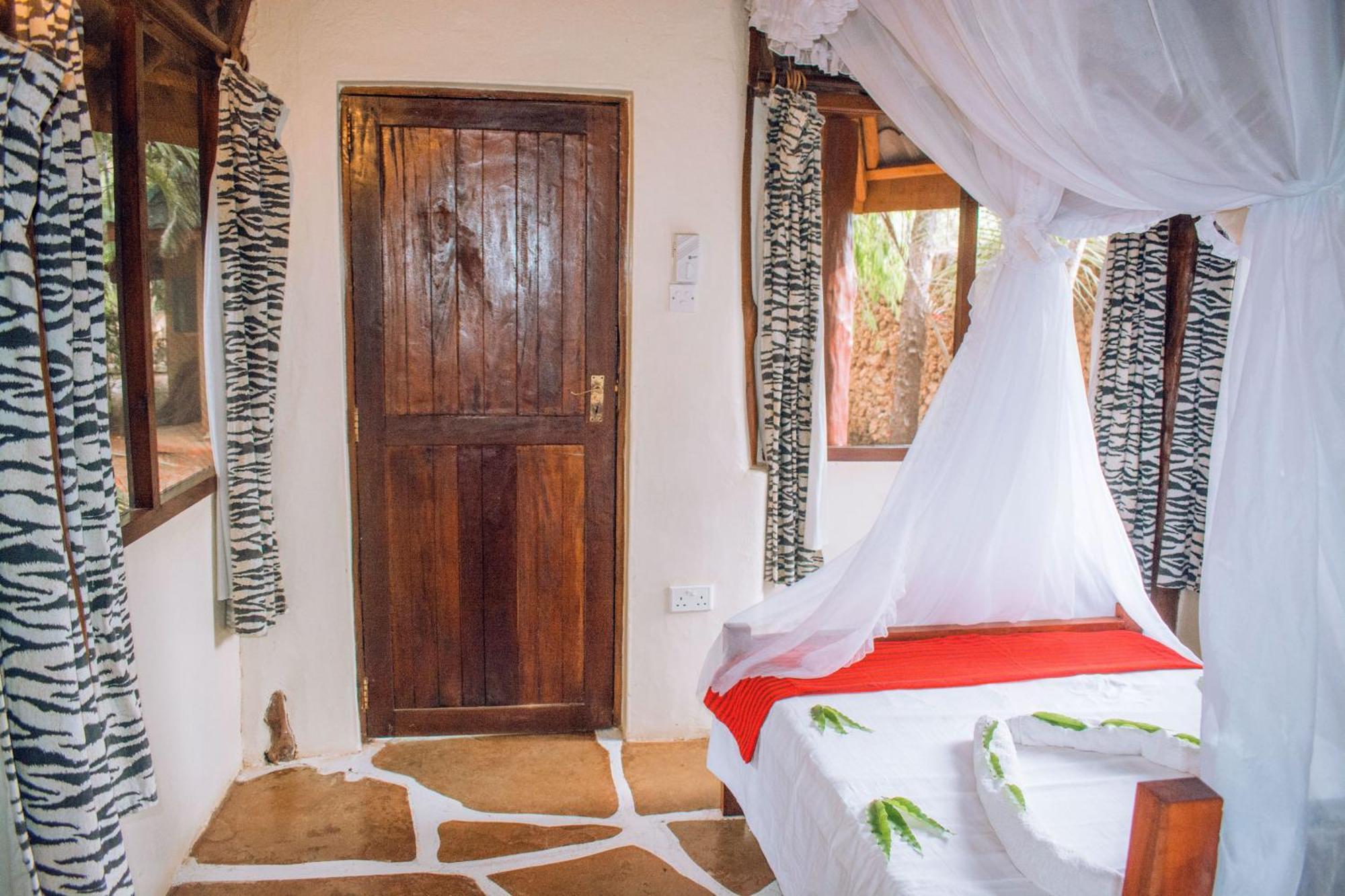 Kijani Cottages In Diani Praia de Diani Exterior foto